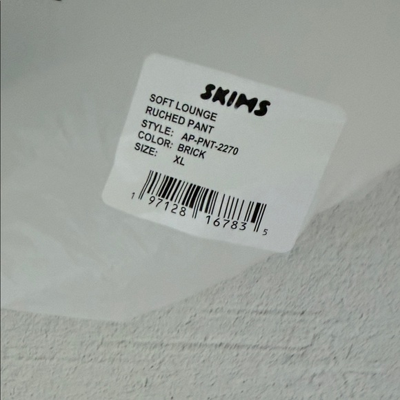 SKIMS Ribbed Drawstring Boot-Cut Pants in Deep Red - Picture 4 of 9